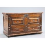 A LATE 17TH CENTURY ELM AND OAK MOULDED-FRONT COFFER