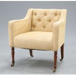 A REGENCY STYLE BUTTON BACK ARMCHAIR