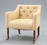 A REGENCY STYLE BUTTON BACK ARMCHAIR