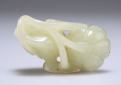 A CHINESE JADE 'LOTUS' CARVING