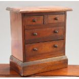 A VICTORIAN MAHOGANY MINIATURE CHEST OF DRAWERS