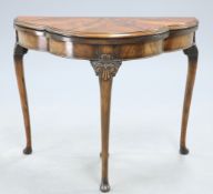 A CHIPPENDALE STYLE MAHOGANY FOLD OVER CARD TABLE, EARLY 20TH CENTURY