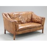 A CONTEMPORARY HALO BROWN LEATHER TWO SEATER SOFA