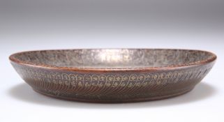 AN INDIAN MYNPURI BRASS INLAID DISH