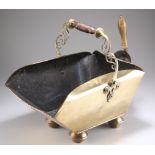 AN EDWARDIAN BRASS COAL SCUTTLE