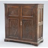 AN 18TH CENTURY AND LATER OAK CABINET