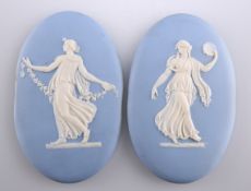 A PAIR OF 19TH CENTURY WEDGWOOD BLUE JASPER PLAQUES