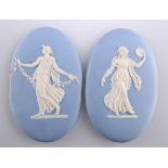 A PAIR OF 19TH CENTURY WEDGWOOD BLUE JASPER PLAQUES