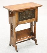 AN ARTS AND CRAFTS OAK DESK