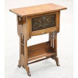 AN ARTS AND CRAFTS OAK DESK