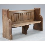 A VICTORIAN OAK PEW