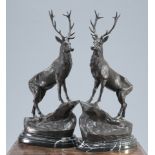 A LARGE PAIR OF BRONZE STAGS