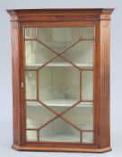 A GEORGE III MAHOGANY HANGING CORNER CABINET