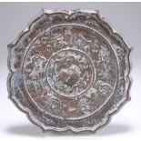 A 19TH CENTURY CHINESE BRONZE MIRROR