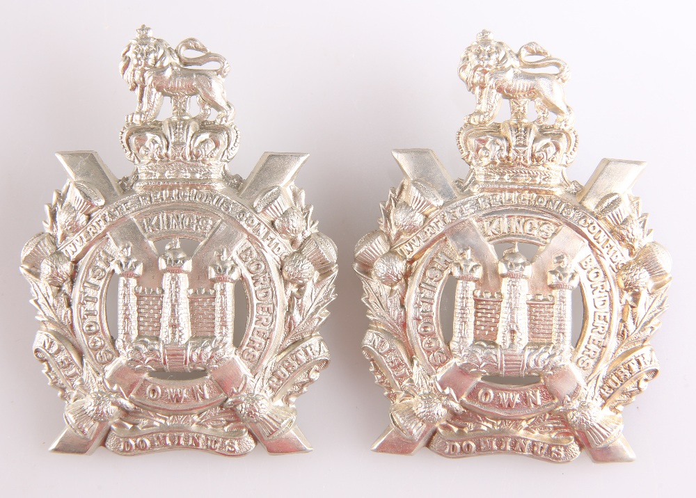 TWO MEDIUM SIZE EXAMPLES OF THE PRE 1902 OTHER RANKS' PATTERN GLENGARRY BADGE KOSB