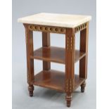 A FRENCH GILT METAL MOUNTED AND MARBLE TOPPED MAHOGANY OCCASIONAL TABLE