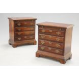 A PAIR OF GEORGE III STYLE MAHOGANY CHEST OF DRAWERS