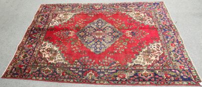 A VINTAGE PERSIAN TABRIZ CARPET