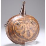 A LEATHER POWDER FLASK, MIDDLE EASTERN OR NORTH AFRICAN