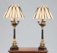 A HANDSOME PAIR OF REGENCY STYLE PARTIALLY GILDED COMPOSITION TABLE LAMPS