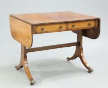 A REGENCY MAHOGANY SOFA TABLE