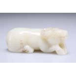 A CHINESE CELADON JADE CARVING OF A BUFFALO