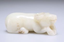 A CHINESE CELADON JADE CARVING OF A BUFFALO