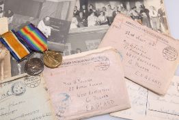 A COLLECTION OF WWI PRISONER OF WAR (POW) LETTERS, A PHOTOGRAPH ALBUM AND TWO WWI MEDALS
