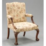 A CHIPPENDALE STYLE MAHOGANY GAINSBOROUGH CHAIR