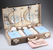 A MID 20TH CENTURY BREXTON PICNIC BASKET SET FOR FOUR PERSONS