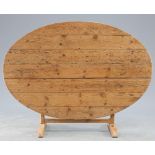 A 19TH CENTURY FRENCH PINE WINE TASTING TABLE