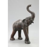 AN UNUSUALLY LARGE LEATHER MODEL OF AN ELEPHANT