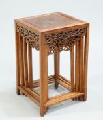 A SET OF FOUR CHINESE INLAID HARDWOOD NESTING TABLES