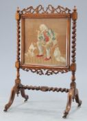 A VICTORIAN ROSEWOOD AND NEEDLEWORK FIRESCREEN