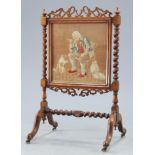 A VICTORIAN ROSEWOOD AND NEEDLEWORK FIRESCREEN