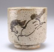 A CHINESE CELADON GLAZED STONEWARE CUP
