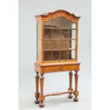 A 19TH CENTURY CONTINENTAL FLORAL MARQUETRY WALNUT CABINET ON STAND