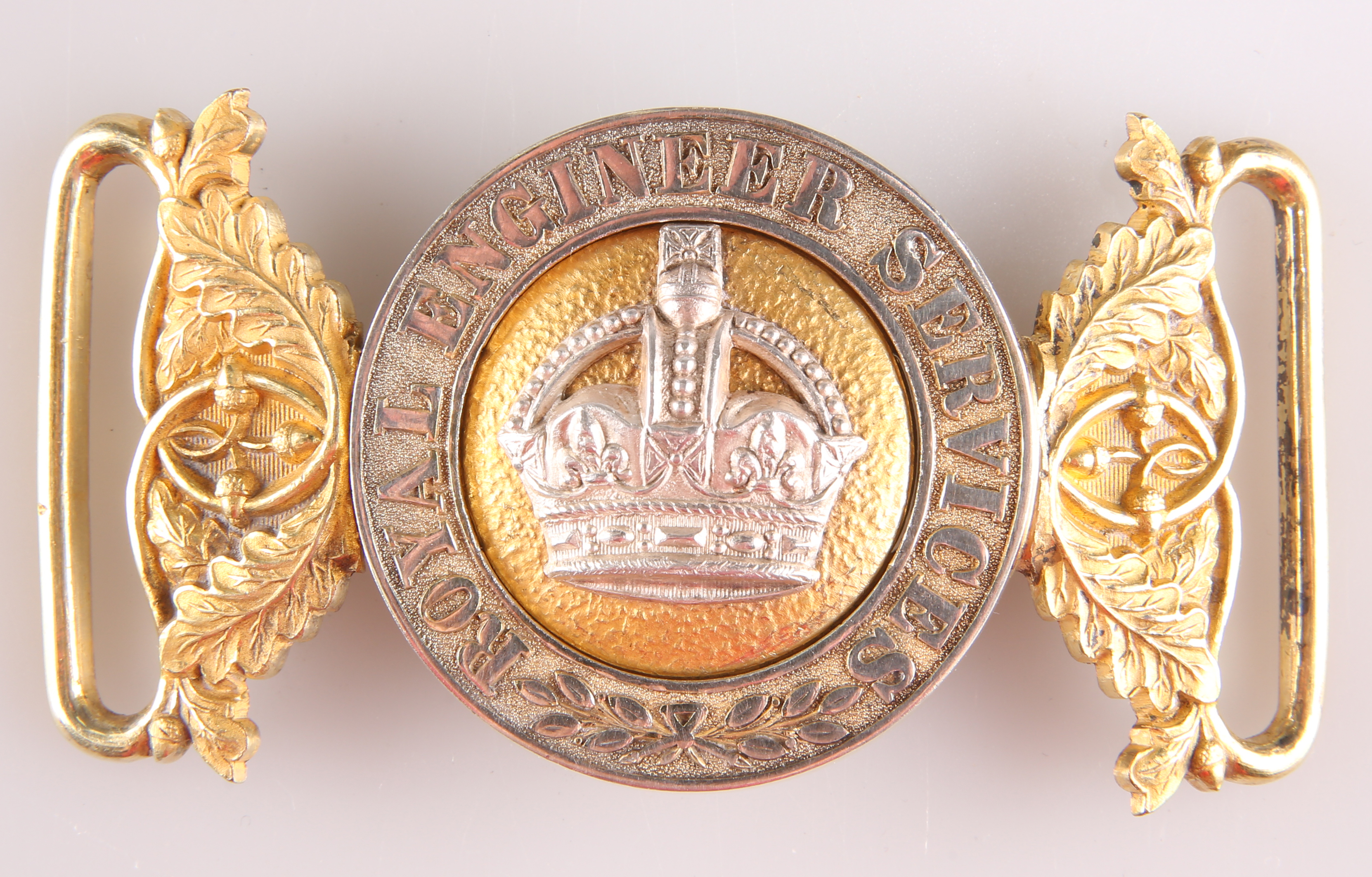 FOUR OFFICERS' PATTERN SILVER AND GILT WAIST BELT CLASPS OF THE ROYAL ENGINEERS