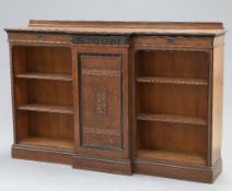 AN AESTHETIC MOVEMENT PARTIALLY EBONISED OAK BOOKCASE