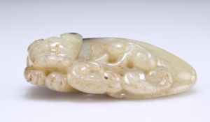 A CHINESE JADE CARVING OF A CAT