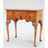 A QUEEN ANNE STYLE BURR WALNUT LOWBOY