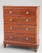 A VICTORIAN MAHOGANY CHEST OF DRAWERS