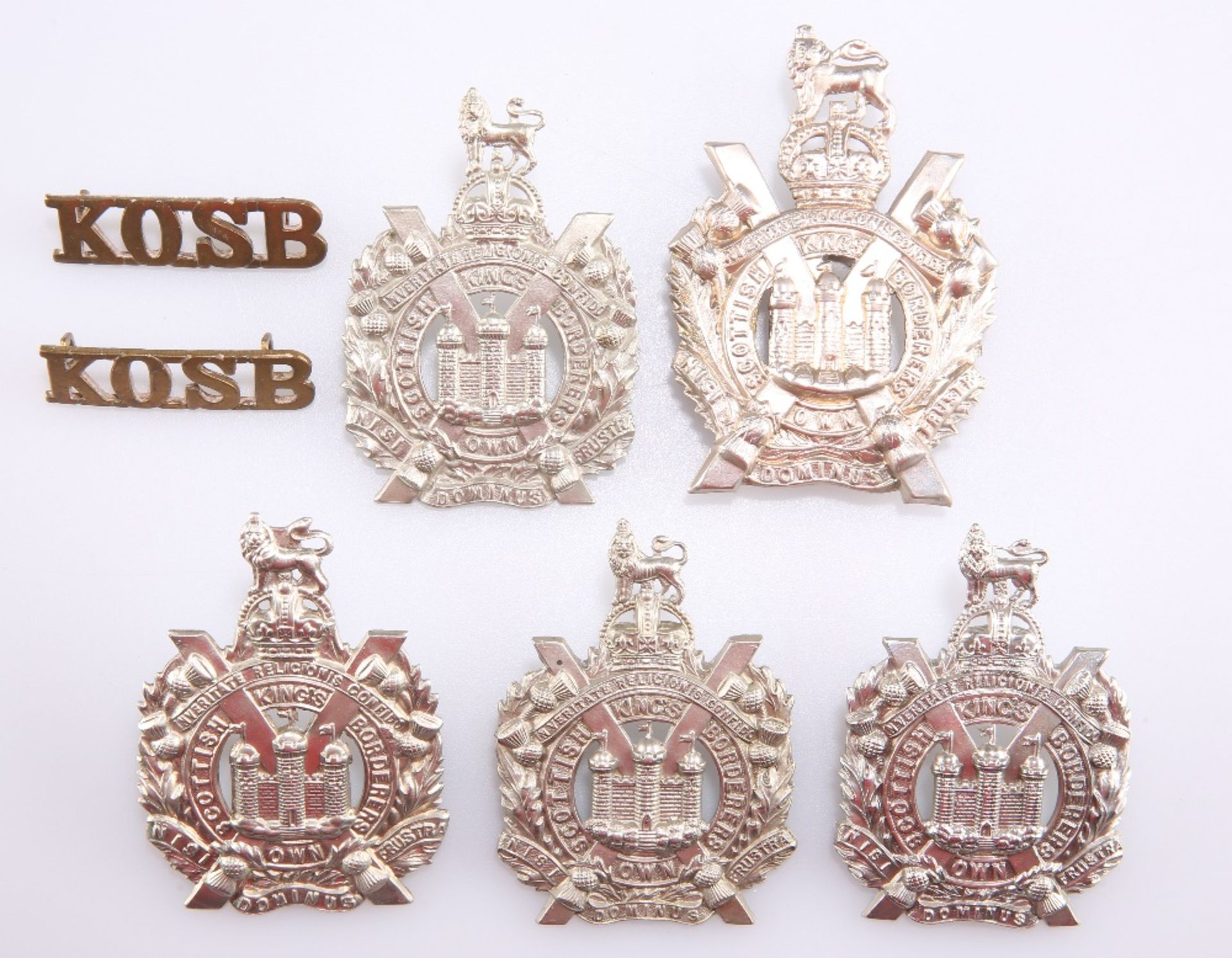 FIVE VARIANT EXAMPLES OF THE POST 1902 GLENGARRY BADGE KOSB