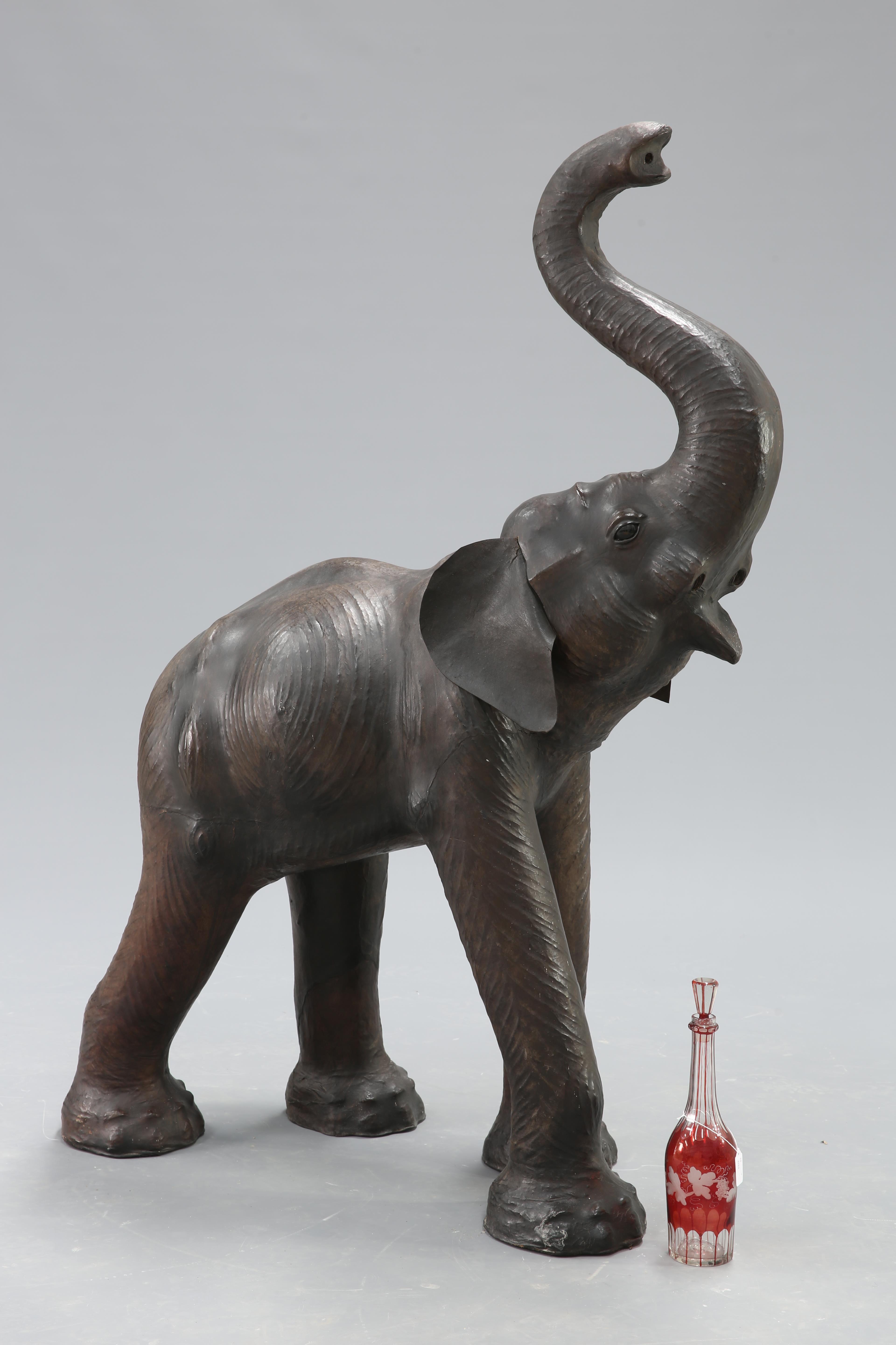 AN UNUSUALLY LARGE LEATHER MODEL OF AN ELEPHANT - Image 3 of 4