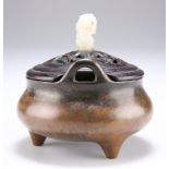 A CHINESE BRONZE TRIPOD CENSER