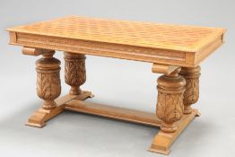 A CARVED OAK AND PARQUETRY CENTRE TABLE