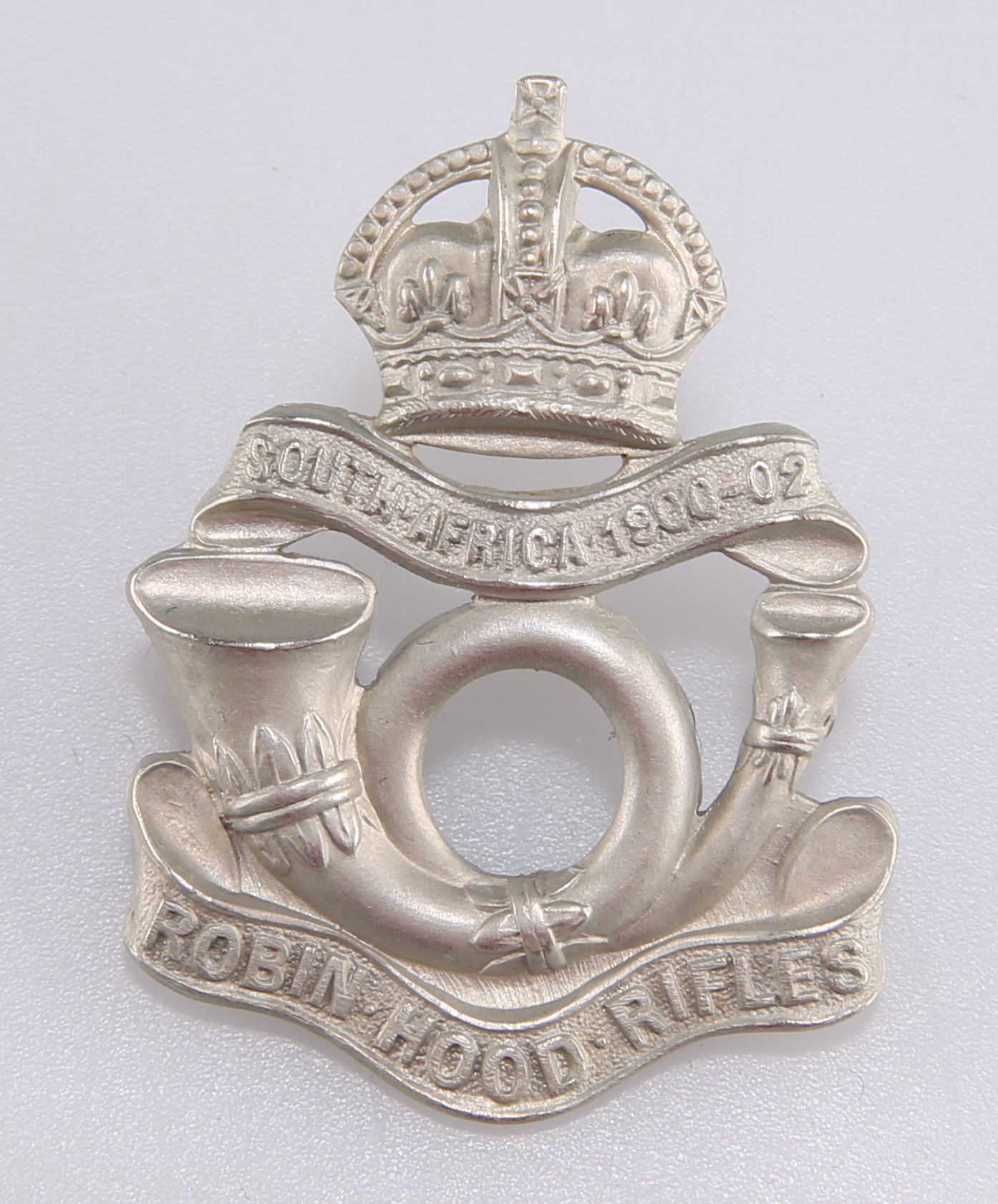 A SCARCE WHITE METAL OTHER RANKS' PATTERN CAP BADGE