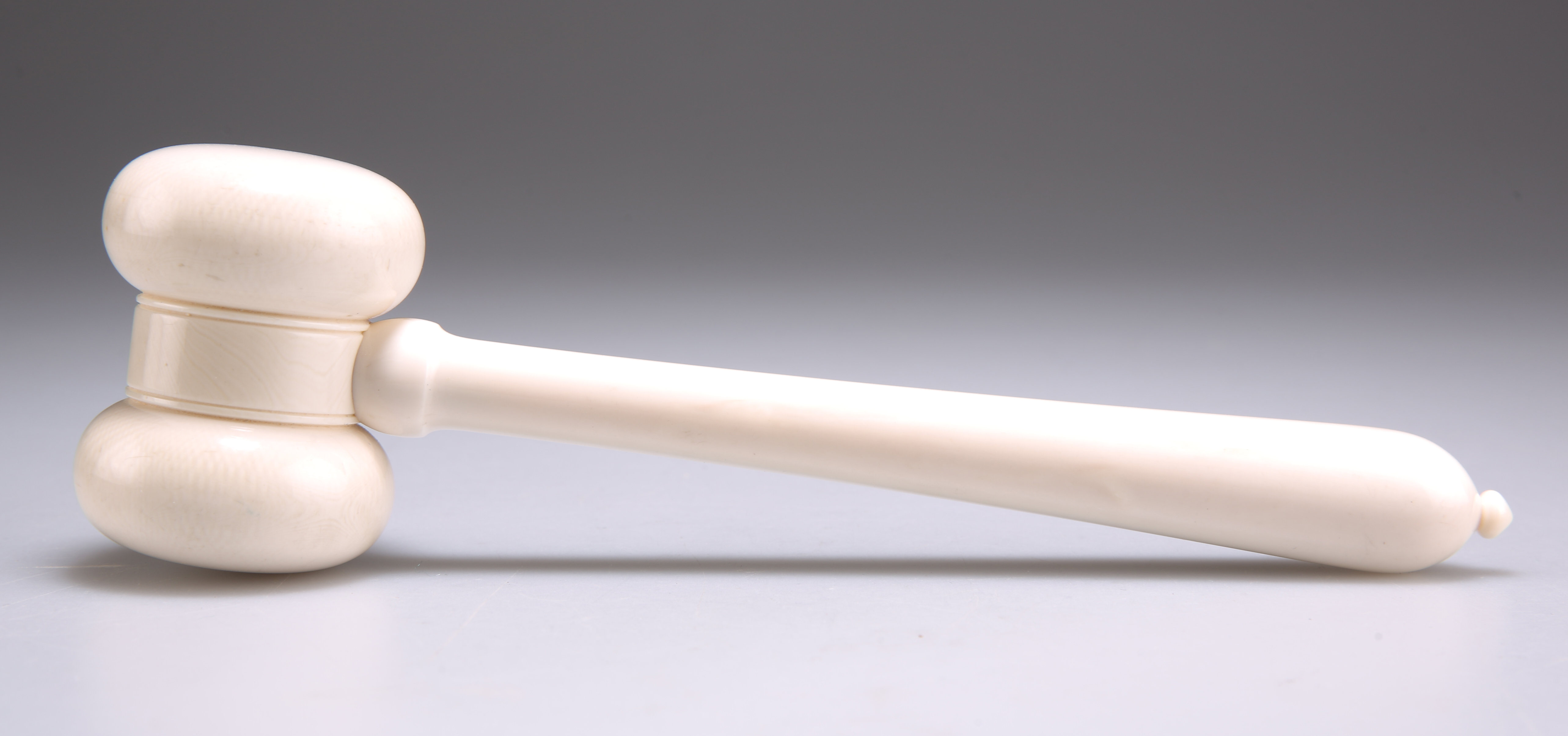 A TURNED IVORY GAVEL