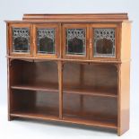 AN ART NOUVEAU MAHOGANY AND LEADED GLASS BOOKCASE BY KENDAL MILNE & CO, MANCHESTER