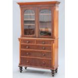 A VICTORIAN MAHOGANY BOOKCASE ON CHEST